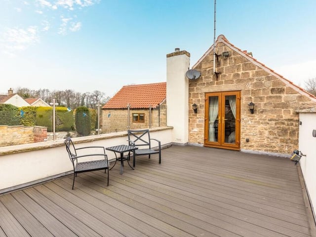 How do you fancy breakfast, or evening drinks, on the roof terrace, which is accessible from the French doors of the master bedroom?