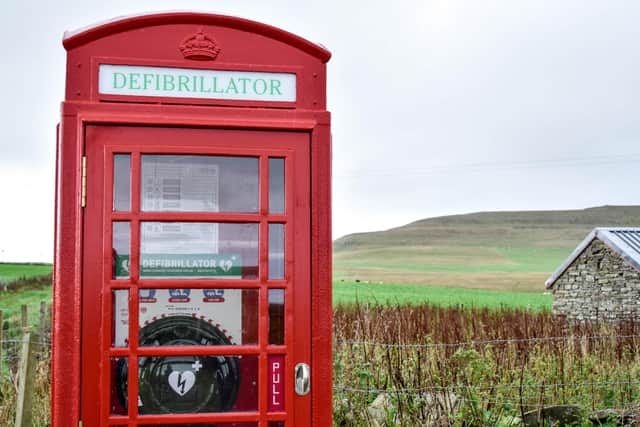 Iconic red phone boxes have been put to many uses, including housing life-saving defibrillators.