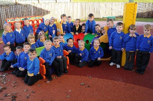 Children of St John's Primary School in Worksop pose for our photographer in 2011.