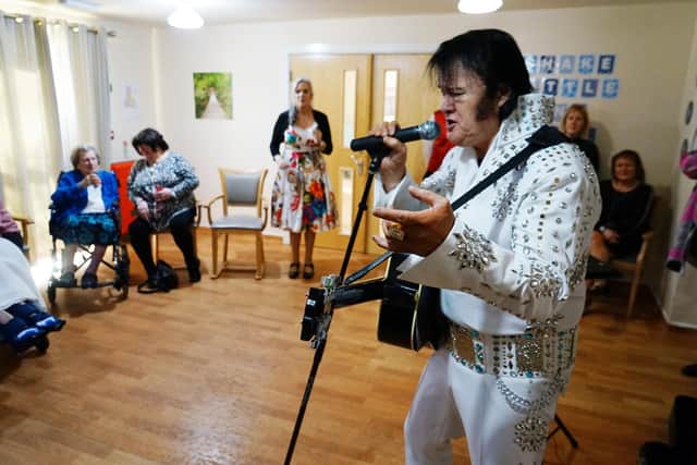 Elvis entertains the residents.