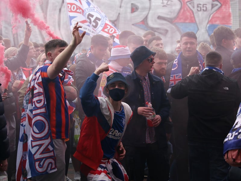 "There's nothing stopping us from celebrating the 55," said one fan from County Antrim, who travelled with a number of supporters from Northern Ireland this morning to see the club claim the 55th title in its history. Picture: Andrew Milligan/PA