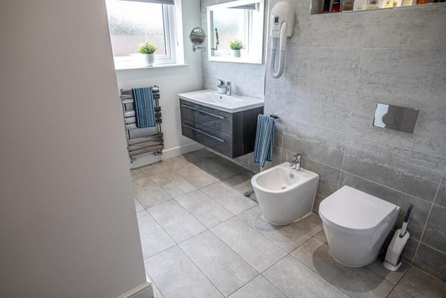 Next stop on our tour of the £469,000 bungalow is the contemporary main bathroom, which includes a bidet.