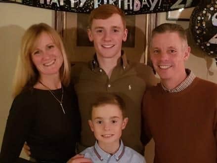 Claire Edmunds with husband Jason and sons Liam, 10 and Lewis, 21