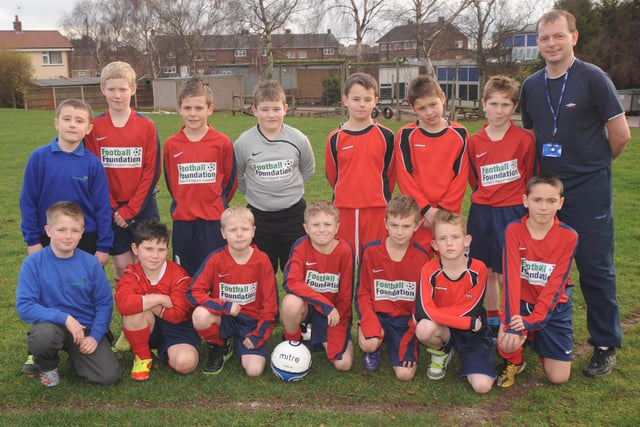 The St Augustine's Junior School boys football team.  Pictured with Chris Kelly