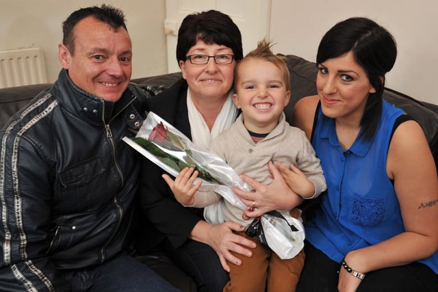 Guardian Rose presentation to Cindy Riley who recognised the symptoms of Strep-B in her Grandson Callum.  Pictured from left George Riley, Cindy Riley, Callum Cashmore, three and Laura Bourne in 2012