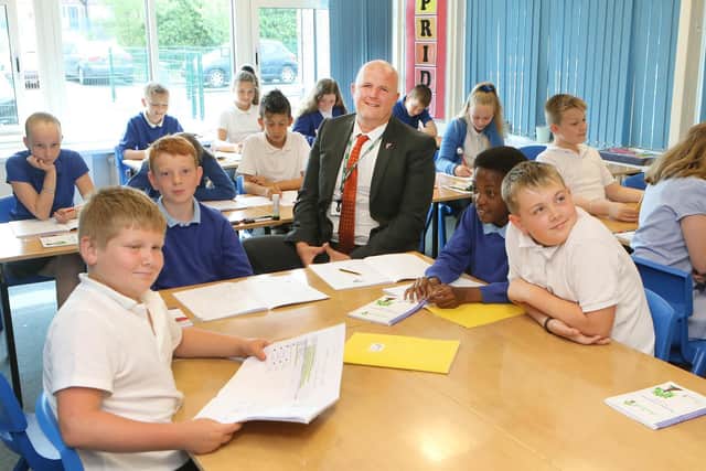 The Forge Trust CEO and former pupil Lee Hessey back in his old classroom with current year five and six pupils