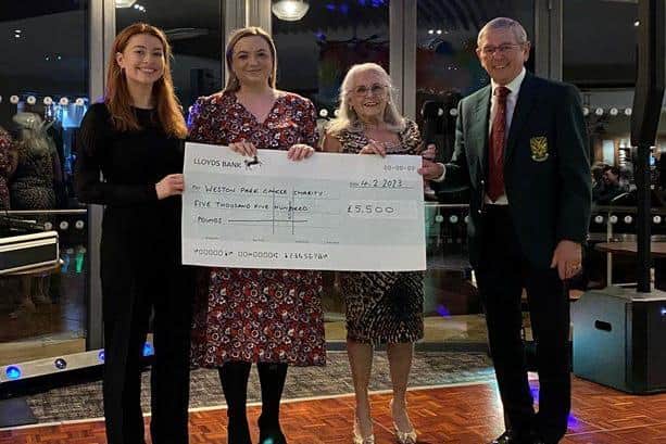 Worksop Golf Club captains present the cheque to Weston Park Cancer Charity.
