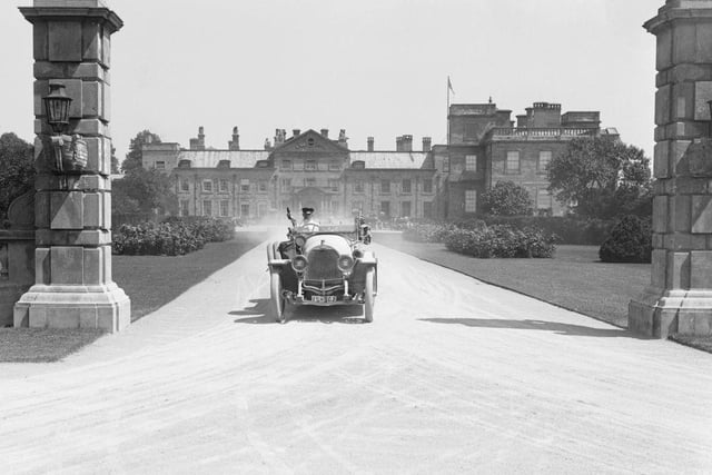 A German Opel racer leaving Welbeck Abbey during the Prince Henry Cup Tour in the 1930's.