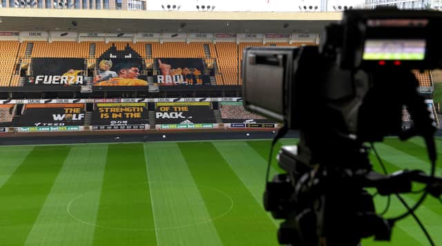 Empty football stadiums and matches being watched via TV and IFollow has been a common theme of 2020. (Photo by Sam Bagnall - AMA/Getty Images)