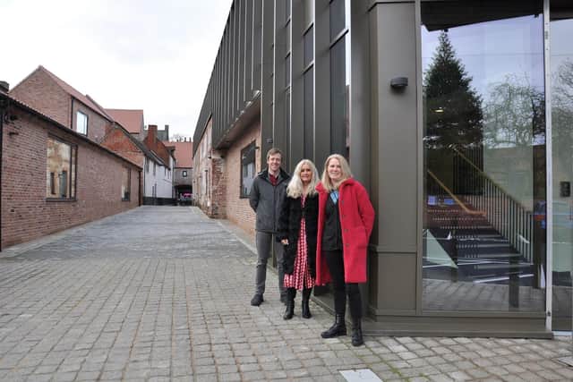 Sally Gillborn (centre) with Councillor James Naish, leader of Bassetlaw District Counciland Councillor Jo White, cabinet member for regeneration, following the BID's move to Worksop