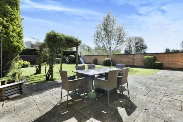 Relax in the summer sunshine in this seating area on the back-garden patio.