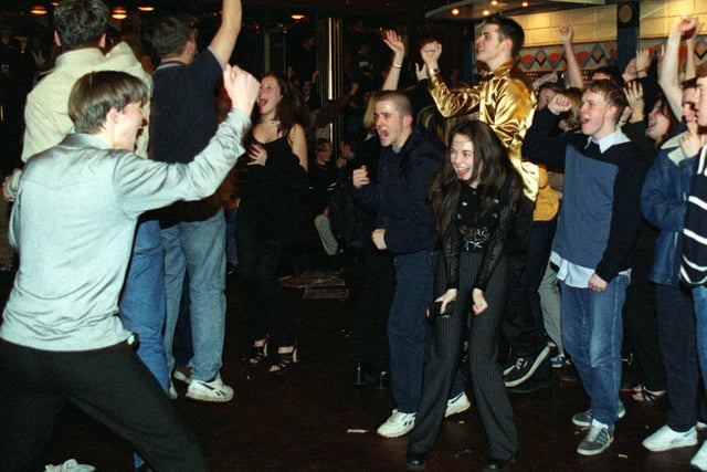 Fans and band members of Cujo hear the announcement that they have won Rock Quest '98  grand final at the Tower lounge in Blackpool