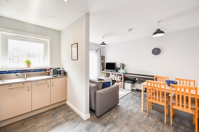 This two-bed apartment comes with a spacious open-plan living room and kitchen space.