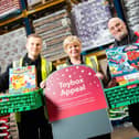 Central England Co-op distribution workers with some of the toys donated during the 2019 appeal.