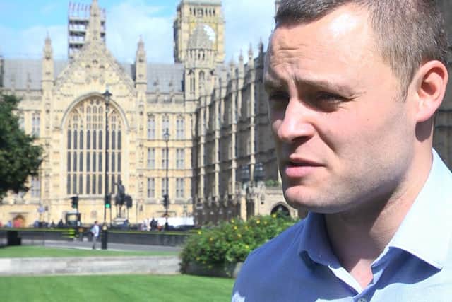 Mansfield's MP Ben Bradley, who is also leader of Nottinghamshire County Council, outside Parliament.