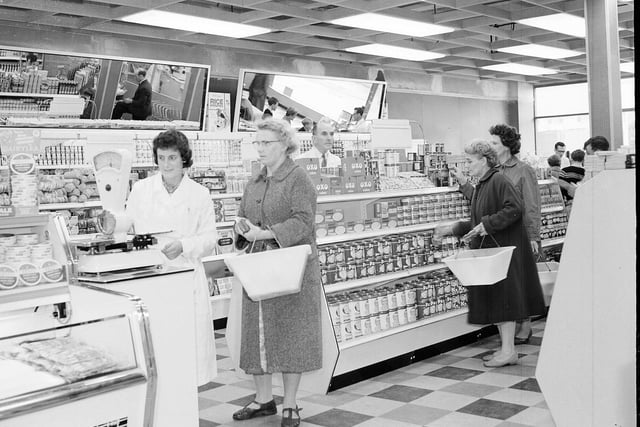 Shopper try the new self-service St Cuthberts Co-operative Store in Drum Street, Gilmerton, in August 1960.