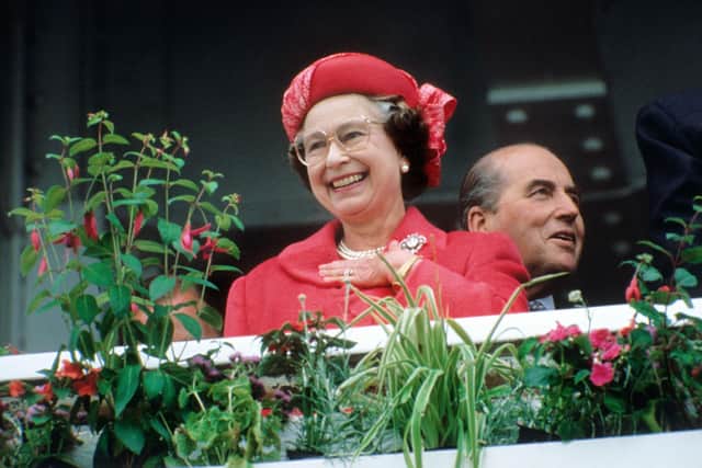 The Queen is rarely happier than when at the races. Here, she is pictured at Epsom on Derby Day in 1989.