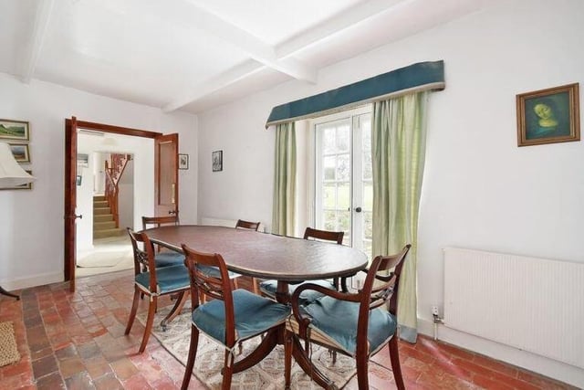 The dining room at the £525,000 cottage also features French doors that provide direct access to the garden.