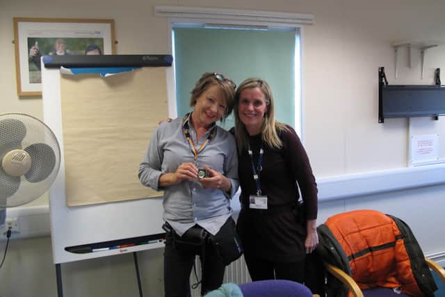 Helen Watkinson is pictured with Adele Fox, deputy director, Forensic Services who nominated her for the award