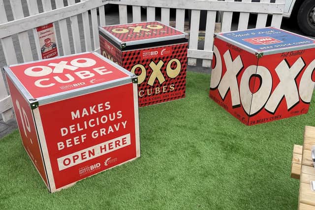 Oxo-themed seats in recognition of the global production of Oxo cubes by Premier Foods in Worksop.