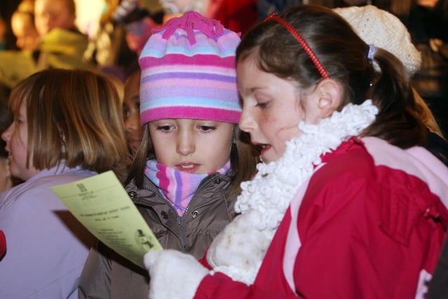 The Retford Christmas Lights Switch On in 2009 where pupils from Ordsall Primary School sang Christmas carols with the help from the Worksop Miners Welfare Brass Band. Pictured are Lucy Evans and Georgia Shearman.