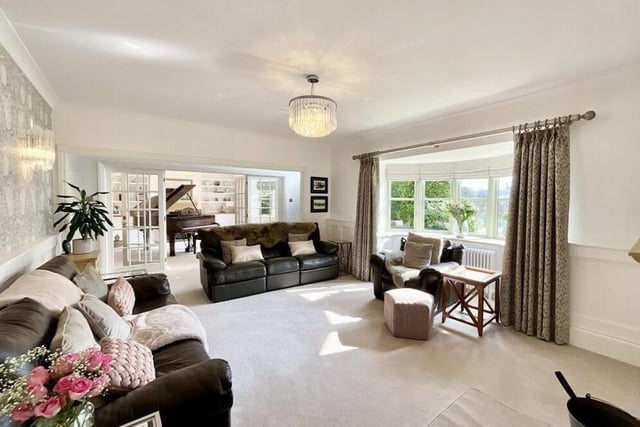 We open our tour of the ground floor in the spacious lounge or sitting room, which is attractively decorated and boasts a large, front-facing bay window, providing plenty of natural light.