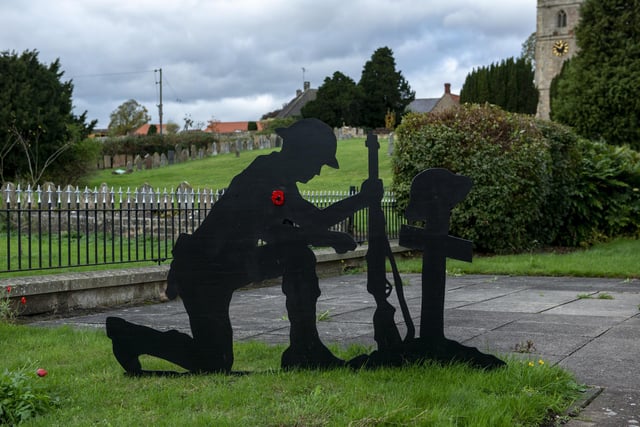 The silhouettes are positioned throughout Warsop