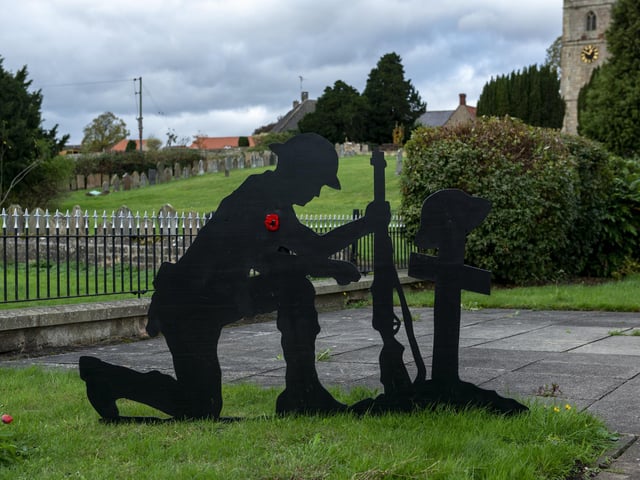 The silhouettes are positioned throughout Warsop