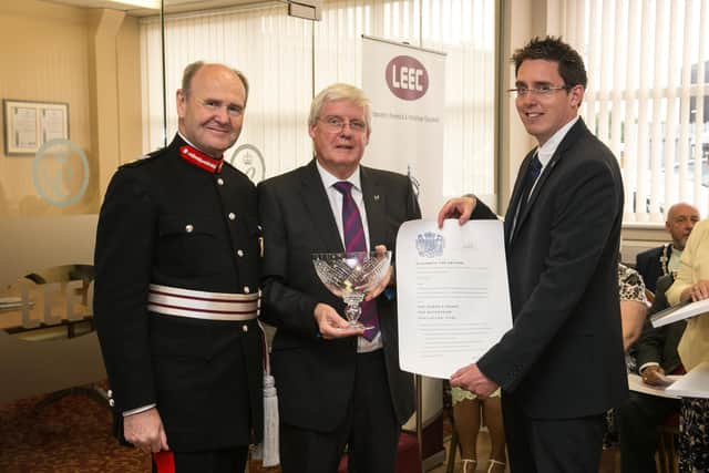 Paul and son Richard receive the Queens Award for International Trade from Sir John Peace, Lord Lieutenant of Nottinghamshire. Photo: Spike Photography
