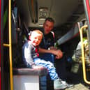 Christian enjoyed sitting in the fire engine.