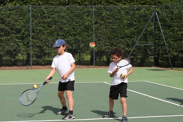 Ben South age 9, Sam South age 7 at a play Tennis Day at Welbeck Tennis Club, Holbeck Woodhouse.