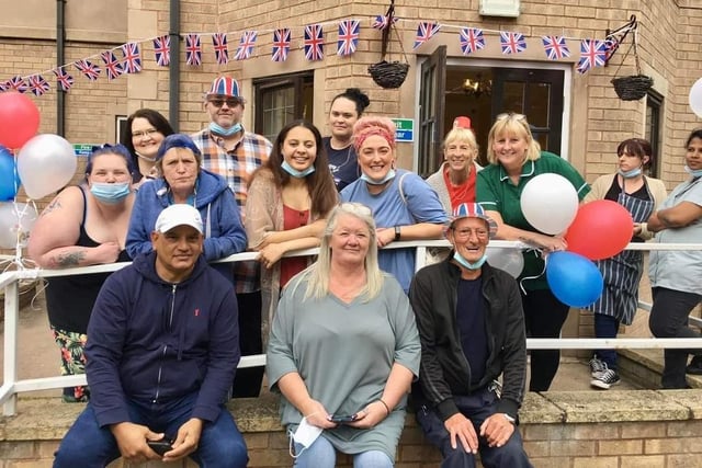 Staff came together to celebrate the day with residents. Pictured: Noah, Marie, Heather, Peter, Lian, Steph, Sherry, Kayley, Rodney, Jackie, Sue, Nakkita, Jolene and Lindsey.