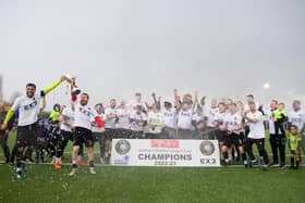 Worksop Town lift the league trophy - photo by Lewis Pickersgill.