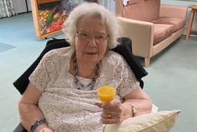 Annie Stubbins, aged 94, celebrates news The Spinney care home in Brimington is staying open.
