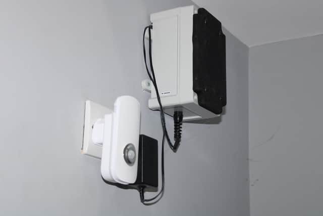 The BEAMS alarm unit listens for specific alarm signals to alert the family.