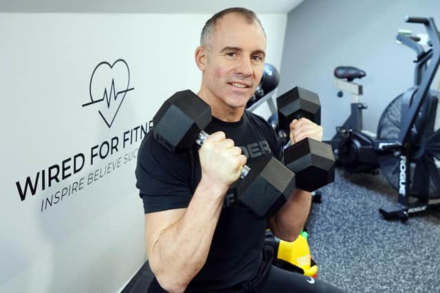 Jonathan White has become a qualified personal trainer with his own home gym.