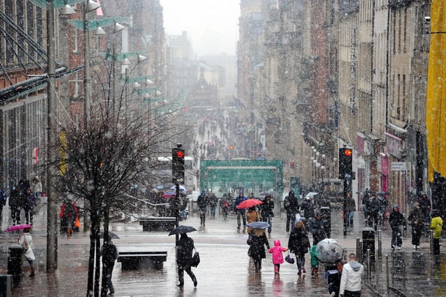 Shoppers and students brave the conditions on Buchanan Street in 2011.