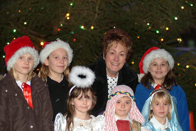 Christmas tree light switch on at Bassetlaw Hospital where pupils from Norbridge School took part in singing Christmas carols in 2009.  Pictured with Margaret Cox.