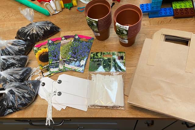 Seed backs include sunflowers and forget me nots.