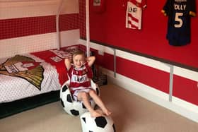 Oliver Laws in his Doncaster Rovers themed room, created after plans to mark his birthday as a mascot at doncaster Rovers collapsed