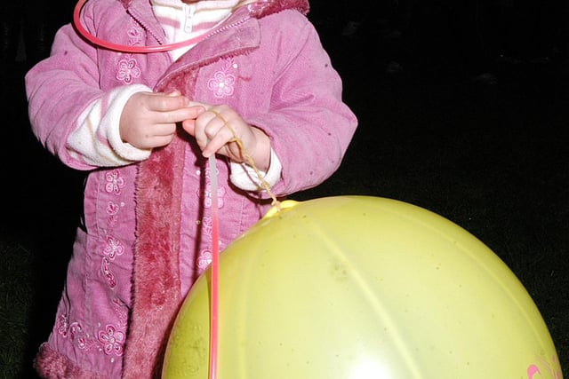 Worksop Rugby Club bonfire. Here is Emily Rose with her giant balloon. Year: 2006