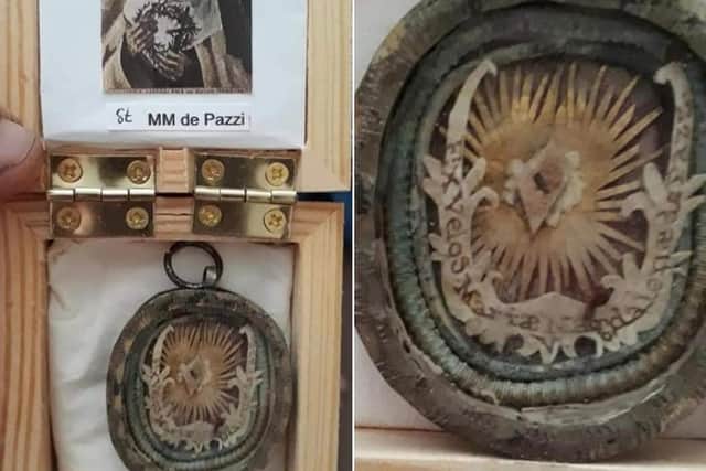 Pictured is one of the stolen reliquaries. The other is round , about 1in across, and made of wood.