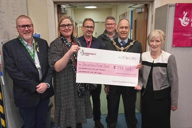 Pictured from left: Food bank chair of trustees, coun Kevin Dukes; Jess and Mark from National Lottery Community Fund; Food Bank manager, Robert Garland; Worksop mayor coun Tony Eaton; Fran Walker