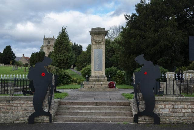 Two soldiers guard the cenotaph
