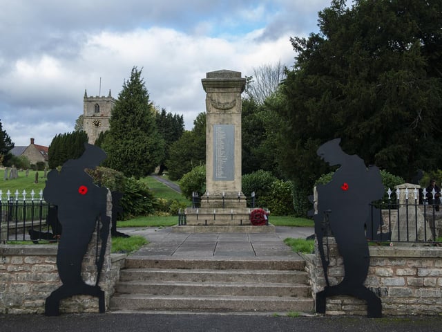 Two soldiers guard the cenotaph