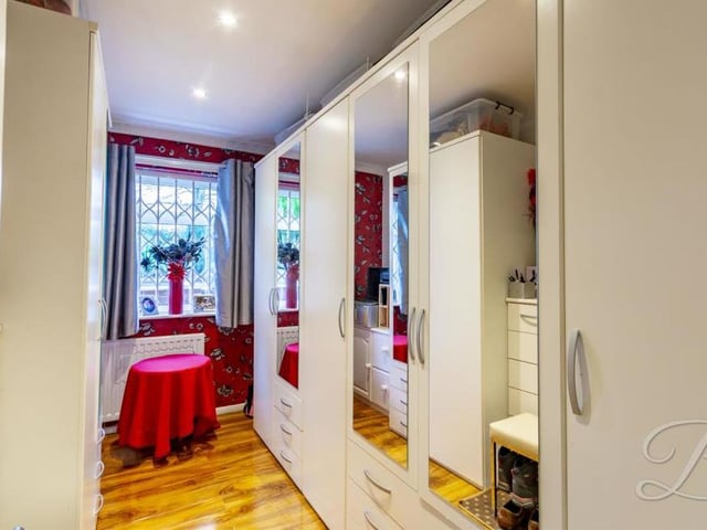 There is plenty of space for wardrobes and storage in the second bedroom.