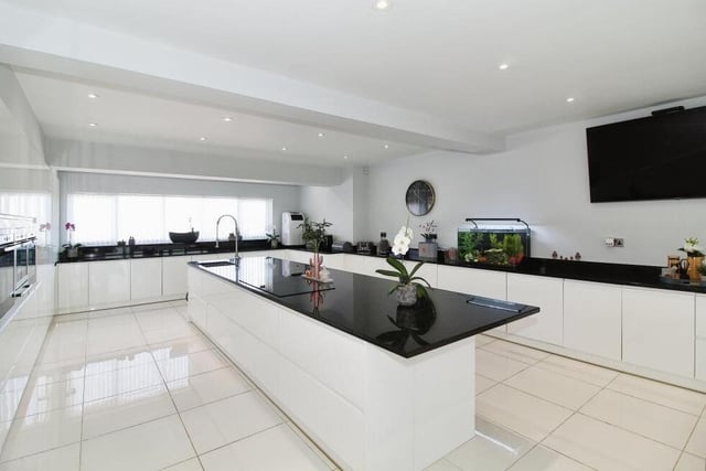 Here is our first look at the wonderful, fitted kitchen at the £1.1 million property. With units surrounding a large breakfast island, it is amazingly spacious.