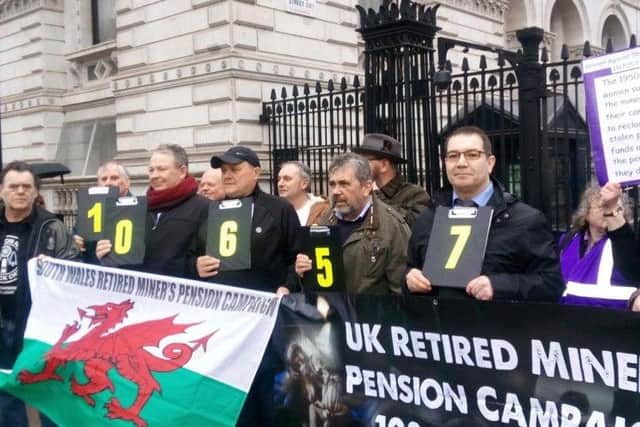 Former mineworkers outside Downing Street in 2019 after handing in a 100,000-strong petition calling for a fairer pension deal
