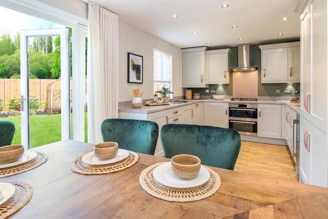The kitchen and dining room in a show home at Gateford Park.
