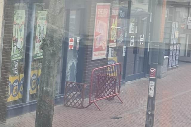 A smashed shop window in Worksop Town Centre